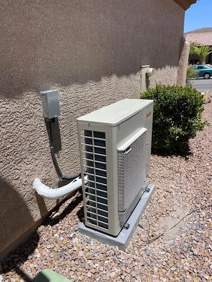 Residential air conditioning condenser unit in Hickory Creek